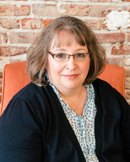 Tracy J. Curtis<br> <hr>  Office Manager Photo